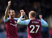 BURNLEY, ENGLAND - APRIL 24: Matej Vydra celebrates with teammate Dwight McNeil of Burnley after scoring their team's first goal during the Premier League match between Burnley and Wolverhampton Wanderers at Turf Moor on April 24, 2022 in Burnley, England. (Photo by Stu Forster/Getty Images)