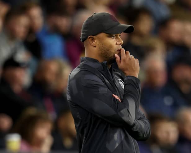 BURNLEY, ENGLAND - AUGUST 16:  Vincent Kompany, Manager of Burnley looks on during the Sky Bet Championship between Burnley and Hull City at Turf Moor on August 16, 2022 in Burnley, England. (Photo by Clive Brunskill/Getty Images)