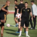 Belgium's forward Eden Hazard (front R) watches Belgium's defender Vincent Kompany during a training session in Rostov-on-Don on July 1, 2018, on the eve of their Russia 2018 World Cup round of 16 football match against Japan. (Photo by Filippo MONTEFORTE / AFP)        (Photo credit should read FILIPPO MONTEFORTE/AFP via Getty Images)