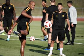 Belgium's forward Eden Hazard (front R) watches Belgium's defender Vincent Kompany during a training session in Rostov-on-Don on July 1, 2018, on the eve of their Russia 2018 World Cup round of 16 football match against Japan. (Photo by Filippo MONTEFORTE / AFP)        (Photo credit should read FILIPPO MONTEFORTE/AFP via Getty Images)