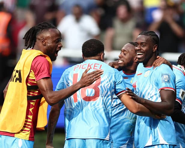 Axel Tuanzebe  is congratulated after his goal for DR Congo seals World Cup qualification (Photo by Ulises Ruiz / AFP via Getty Images)