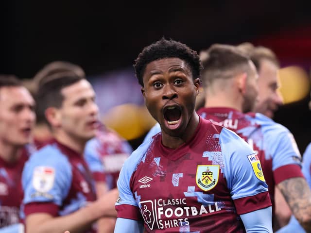 BURNLEY, ENGLAND - APRIL 10: Nathan Tella of Burnley reacts after Johann Berg Gudmundsson scores the opening goal during the Sky Bet Championship between Burnley and Sheffield United at Turf Moor on April 10, 2023 in Burnley, England. (Photo by Alex Livesey/Getty Images)