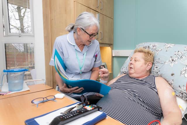 One of the 35 nursing staff members from the inpatients’ unit tends to the needs of a patient at Pendleside Hospice.