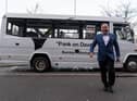 Dave Fishwick arrives at the premiere of his Netflix film Bank of Dave at Reel Cinema in Burnley in one of his own minibuses