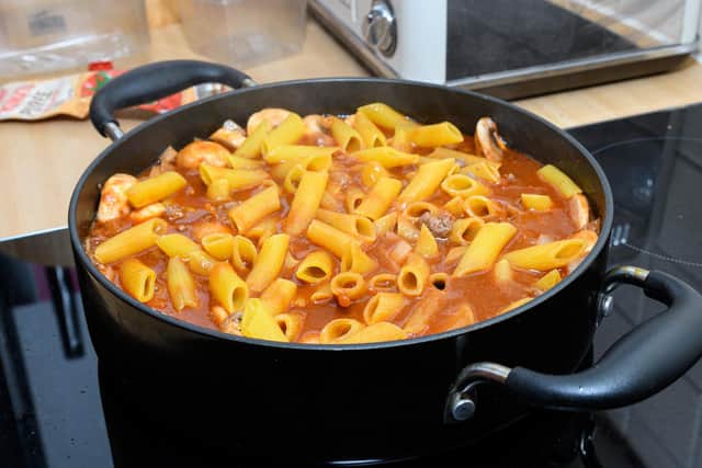 Pasta Bolognese - Finally the pasta is added and left to cook for twenty minutes. Photo: Kelvin Stuttard