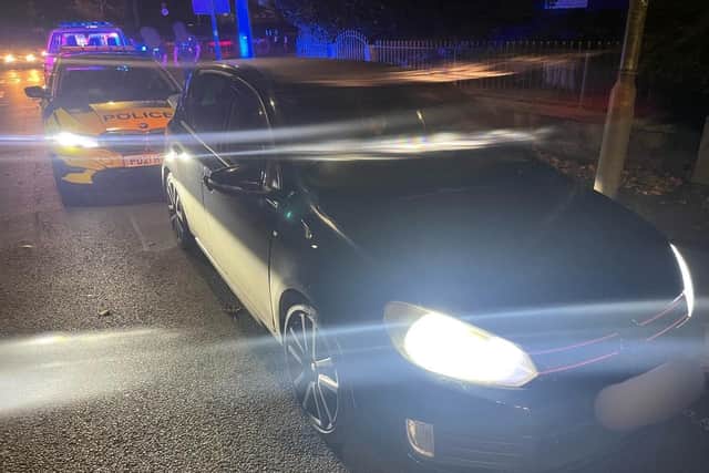 A VW Golf which caught an officer’s attention on New Hall Lane, Preston, thanks to an illegal registration plate and excess speed (Credit: Lancashire Police)