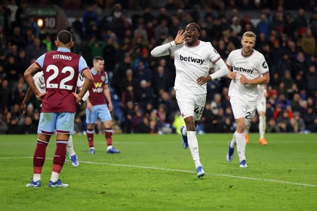 BURNLEY, ENGLAND - NOVEMBER 25: Divin Mubama of West Ham United celebrates after scoring the team's first goal during the Premier League match between Burnley FC and West Ham United at Turf Moor on November 25, 2023 in Burnley, England. (Photo by Matt McNulty/Getty Images)