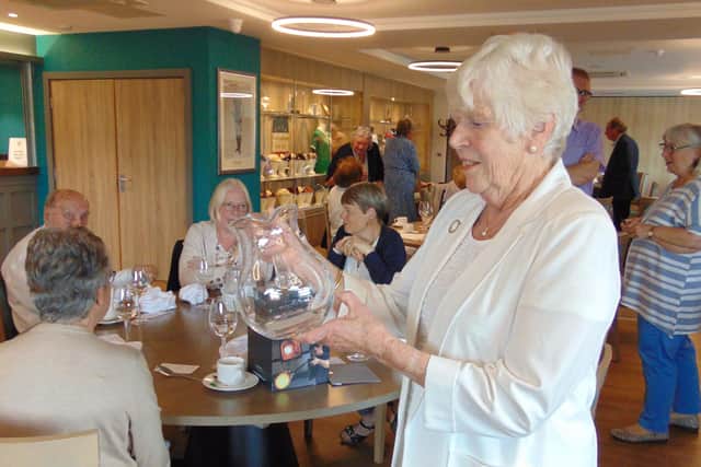 Cynthia Morris, one of the founder members of the Burnley Talking Newspaper 45 years ago, was presented with an engraved crystal water jug at the organisation's anniversary lunch.