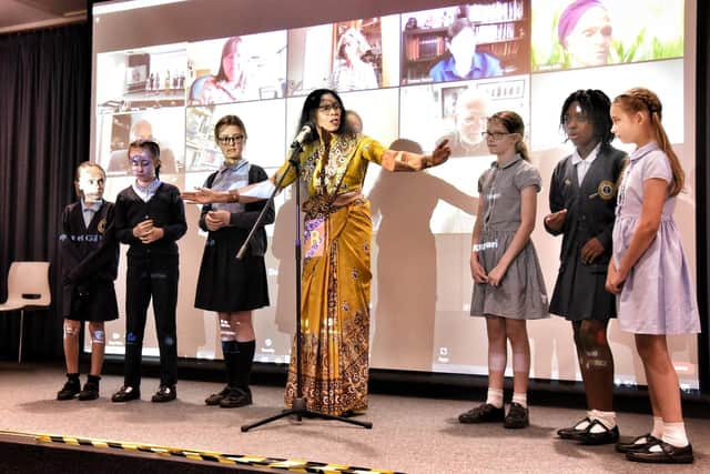 School pupils joined  the stage with Sitakumari at the launch of Heartstone Odyssey Book Festival  Photo: Julian Brown