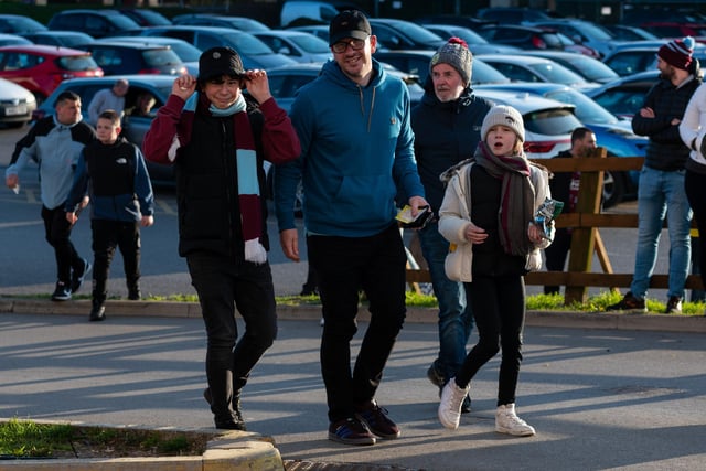 Burnley fans arrive at the New York Stadium ahead of their Championship fixture with Rotherham United. Photo: Kelvin Stuttard