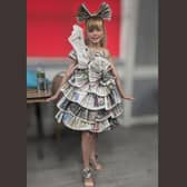 Mia Jarrold (11) was crowned Miss Junior Teen at the Warrington based Endeavour United Kingdom pageant. Here she is in her dress made entirely of newspapers that caught the judges' attention in the Endeavour Wear round