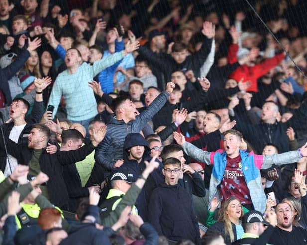 BURNLEY, ENGLAND - NOVEMBER 13: Burnley fans show their support prior to the Sky Bet Championship between Burnley and Blackburn Rovers at Turf Moor on November 13, 2022 in Burnley, England. (Photo by Nathan Stirk/Getty Images)