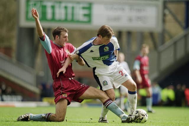 1 Apr 2001:  Alan Mahon of Blackburn Rovers holds the ball up against Glen Little of Burnley during the Nationwide League Division One match played at Ewood Park, in Blackburn, England. Blackburn Rovers won the match 5-0. \ Mandatory Credit: Jamie McDonald /Allsport