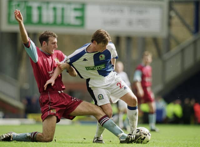 1 Apr 2001:  Alan Mahon of Blackburn Rovers holds the ball up against Glen Little of Burnley during the Nationwide League Division One match played at Ewood Park, in Blackburn, England. Blackburn Rovers won the match 5-0. \ Mandatory Credit: Jamie McDonald /Allsport