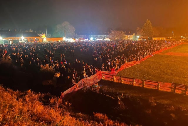 The crowds enjoying the bonfire and firework display at Lowerhouse Cricket Club.