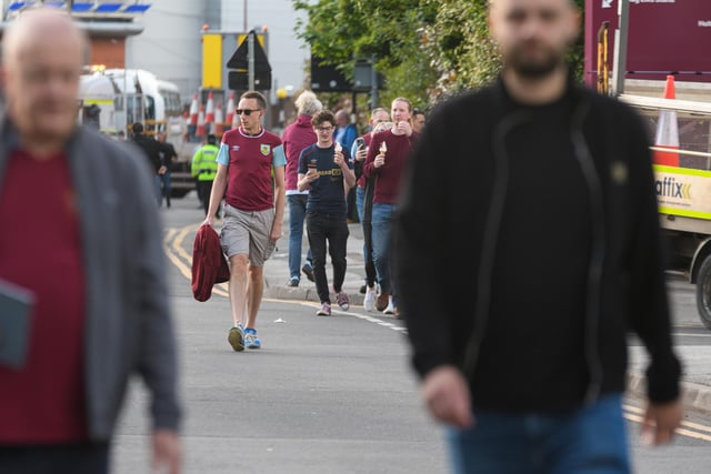 Burnley fans arrive at Villa Park ahead of the Aston Villa v Burnley game. Photo: Kelvin Stuttard