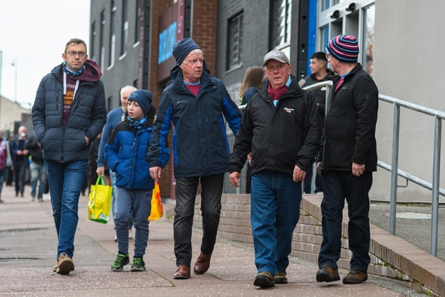 Burnley fans arrive at Turf Moor ahead of the Championship fixture against Swansea City. Photo: Kelvin Stuttard