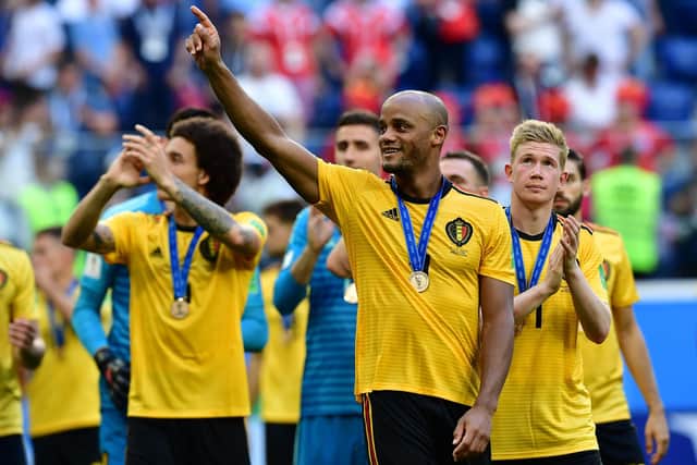 Belgium's defender Vincent Kompany (2ndR) and teammates celebrate their victory at the end of their Russia 2018 World Cup play-off for third place football match between Belgium and England at the Saint Petersburg Stadium in Saint Petersburg on July 14, 2018.