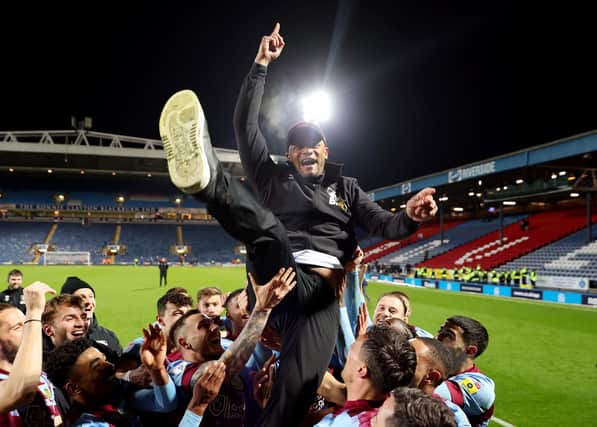 The manager of Burnley FC has led the Clarets back to the Premier League in his first season in charge.
Vincent Kompany, who has four Premier League titles with Manchester City under his belt as an ex-player, helped Burnley finish 10 points above runners-up Sheffield United and 21 above third-place Luton Town. Under Kompany, the club lost just three times and finished the season on 101 points.
The historic victory has helped heal the wounds of demotion 12 months ago after six years in the Premier League. There is perhaps no better measurement of the pride and togetherness that the 37-year-old Belgian has brought to Burnley than the thousands of people descending on the town centre to witness the club's promotion parade.
Kompany, named EFL Championship Manager of the Year 2023, continues to lead Burnley FC, having signed a new five-year deal.