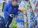Police are investigating after footage captures two men stealing aftershave from Depher CIC UK's charity shop in Keirby Walk, Burnley.