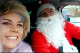 Married couple Beth and Getty Schinkel, of Burnley, dressed up as a fairy and Santa to help spread Christmas magic to children in need.