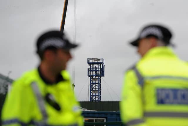 Protesters and police at the fracking site on Preston New Road