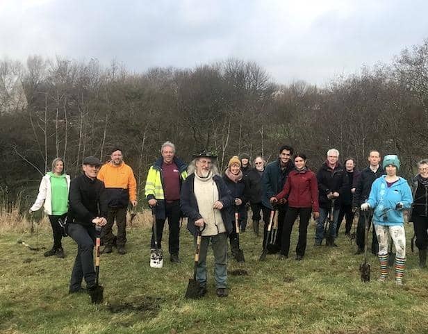 Trees for Burnley volunteers in action on previous tree planting days