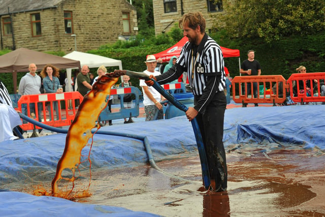 There were referees on hand because gravy wrestling takes some officiating