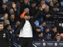 Burnley's Belgian manager Vincent Kompany gestures on the touchline during the English FA Cup quarter-final football match between Manchester City and Burnley at the Etihad Stadium in Manchester, north-west England, on March 18, 2023. (Photo by Oli SCARFF / AFP)