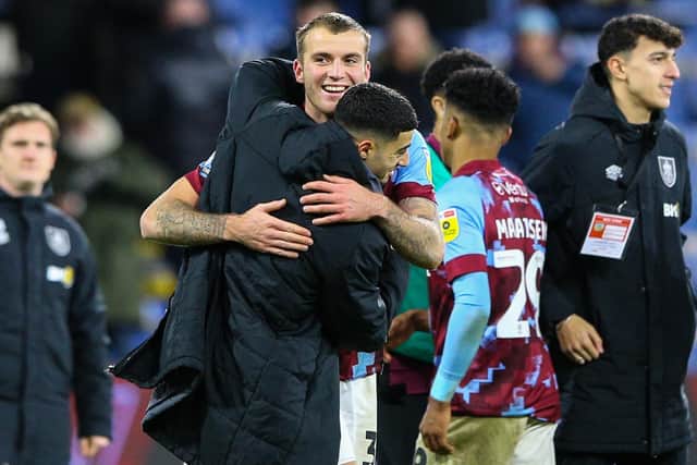 Burnley's Jordan Beyer celebrates with Anass Zaroury after the match

The EFL Sky Bet Championship - Burnley v Coventry City - Saturday 14th January 2023 - Turf Moor - Burnley