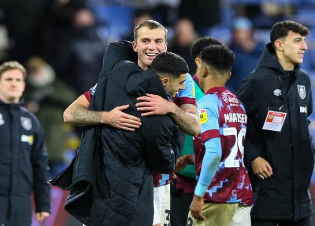 Burnley's Jordan Beyer celebrates with Anass Zaroury after the match

The EFL Sky Bet Championship - Burnley v Coventry City - Saturday 14th January 2023 - Turf Moor - Burnley