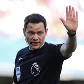 LONDON, ENGLAND - MARCH 30: Darren England, Football Referee, gestures during the Premier League match between Chelsea FC and Burnley FC at Stamford Bridge on March 30, 2024 in London, England. (Photo by Richard Pelham/Getty Images)