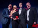 Keeley Beaumont (Director of Fence Gate Lodge) and Chris Hoban (Lodge Manager) collecting the Lancashire Perfect Stay award at the Lancashire Tourism Awards.