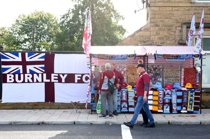 BURNLEY, ENGLAND - OCTOBER 07: Burnley fans arrive at the stadium prior to the Premier League match between Burnley FC and Chelsea FC at Turf Moor on October 07, 2023 in Burnley, England. (Photo by George Wood/Getty Images)