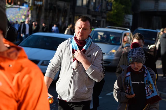 Burnley fans arrive at Turf Moor ahead of the Championship fixture with Blackburn Rovers. Photo: Kelvin Stuttard