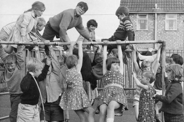 This is my favourite of these photos - showing children at the Grange after-school play centre - all the way back in 1969! How many more children can that pole hold up?