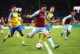 BURNLEY, ENGLAND - APRIL 21: Connor Roberts of Burnley attempts to cross the ball during the Premier League match between Burnley and Southampton at Turf Moor on April 21, 2022 in Burnley, England. (Photo by Clive Brunskill/Getty Images)