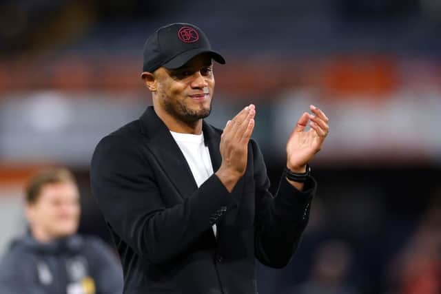 LUTON, ENGLAND - OCTOBER 03: Vincent Kompany, Manager of Burnley, applauds the fans following the team's victory during the Premier League match between Luton Town and Burnley FC at Kenilworth Road on October 03, 2023 in Luton, England. (Photo by Marc Atkins/Getty Images)