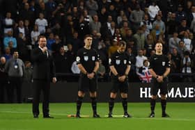 Russell Watson sings the national anthem at Deepdale on Tuesday night.