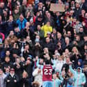 BURNLEY, ENGLAND - MARCH 16: David Datro Fofana of Burnley celebrates with the fans after scoring his team's second goal during the Premier League match between Burnley FC and Brentford FC at Turf Moor on March 16, 2024 in Burnley, England. (Photo by Matt McNulty/Getty Images)