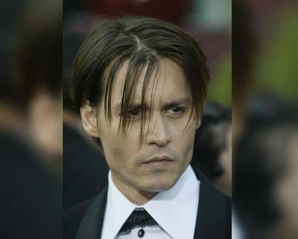 Johnny Depp arrives for the 76th Academy Awards ceremony 29 February, 2004 at the Kodak Theater in Hollywood, CA, after being nominated for Best Actor for his performance in "Pirates of the Caribbean: The Curse of the Black Pearl." Credit: Jeff HAYNES/AFP via Getty Images.