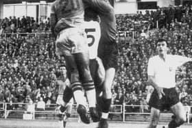 England goalkeeper Colin McDonald (hands up), team mate Billy Wright and a Brazilian player collide in the air during the England-Brazil World Cup match at Gothenburg, Sweden, 11th June 1958. The match ended in a goalless draw.
(Photo by Central Press/Hulton Archive/Getty Images)