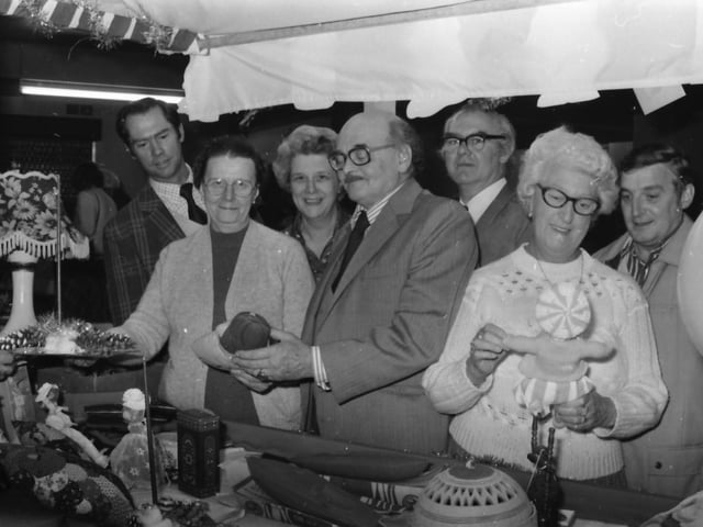 Conservative Association members examining items on sale are (from the left): County Coun. J. Wyld, Miss D. Roylance (treasurer), Coun. Mrs E. Tate, Coun. L. Bullock (chairman), Coun. M. Tate and Coun. Mrs I. Sutcliffe.