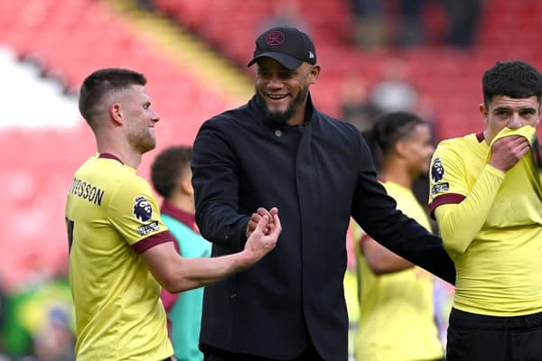 SHEFFIELD, ENGLAND - APRIL 20: Burnley manager Vincent Kompany congratulates Johann Berg Gudmundsson after the Premier League match between Sheffield United and Burnley FC at Bramall Lane on April 20, 2024 in Sheffield, England. (Photo by Stu Forster/Getty Images)