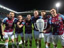 BLACKBURN, ENGLAND - APRIL 25: (L-R) Jay Rodriguez, Josh Brownhill, Josh Cullen, Ashley Barnes, Johann Gudmundsson and Jack Cork of Burnley pose for a photo after winning the Sky Bet Championship following victory against the Blackburn Rovers and Burnley at Ewood Park on April 25, 2023 in Blackburn, England. (Photo by Matt McNulty/Getty Images)
