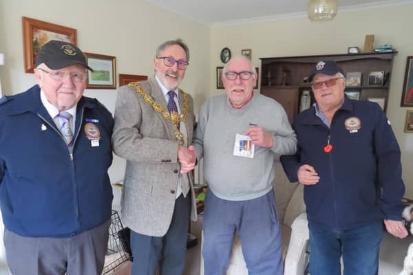The Mayor of Pendle Councilor Brian Newman presented former Mayor and Alderman of Pendle George Adam with a Nuclear Test Medal