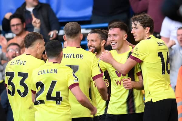 LONDON, ENGLAND - MARCH 30: Dara O'Shea of Burnley celebrates scoring his team's second goal with teammates during the Premier League match between Chelsea FC and Burnley FC at Stamford Bridge on March 30, 2024 in London, England. (Photo by Alex Broadway/Getty Images)