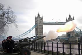 Members of the Honourable Artillery Company fire a gun salute from the wharf at the Tower of London to mark the official start of the Platinum Jubilee. Picture date: Monday February 7, 2022.