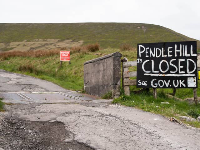Signs around Pendle Hill claim that it is still closed despite the lockdown restrictions being relaxed. Photo: Kelvin Stuttard:.