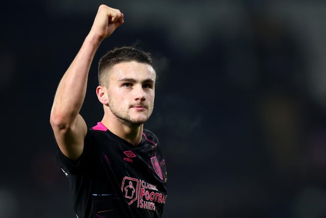 SWANSEA, WALES - JANUARY 02: Taylor Harwood-Bellis of Burnley celebrates following his team's victory in the Sky Bet Championship between Swansea City and Burnley at Liberty Stadium on January 02, 2023 in Swansea, Wales. (Photo by Dan Istitene/Getty Images)